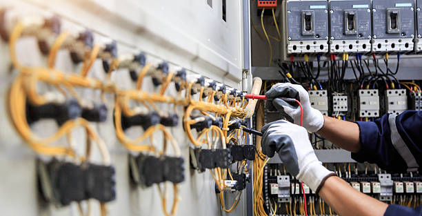 Professional Electrician technician working in Morrow, GA